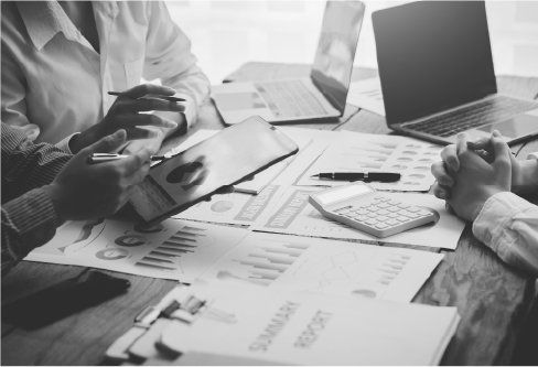 Investment professionals discussing financial strategy